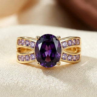 Gouden ring met open band en amethist