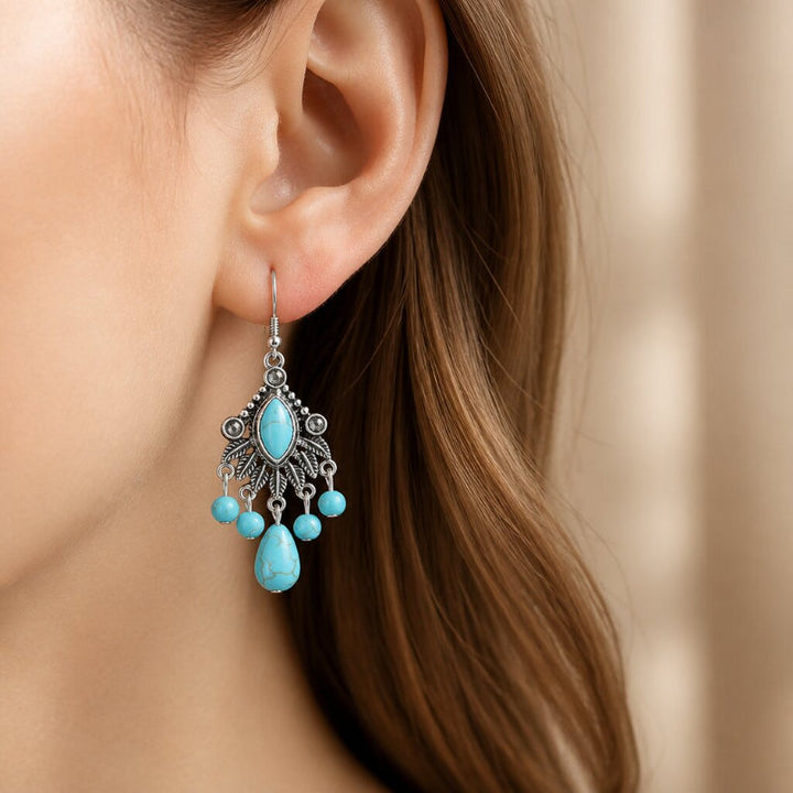 Türkisfarbene Chandelier-Quastenohrringe