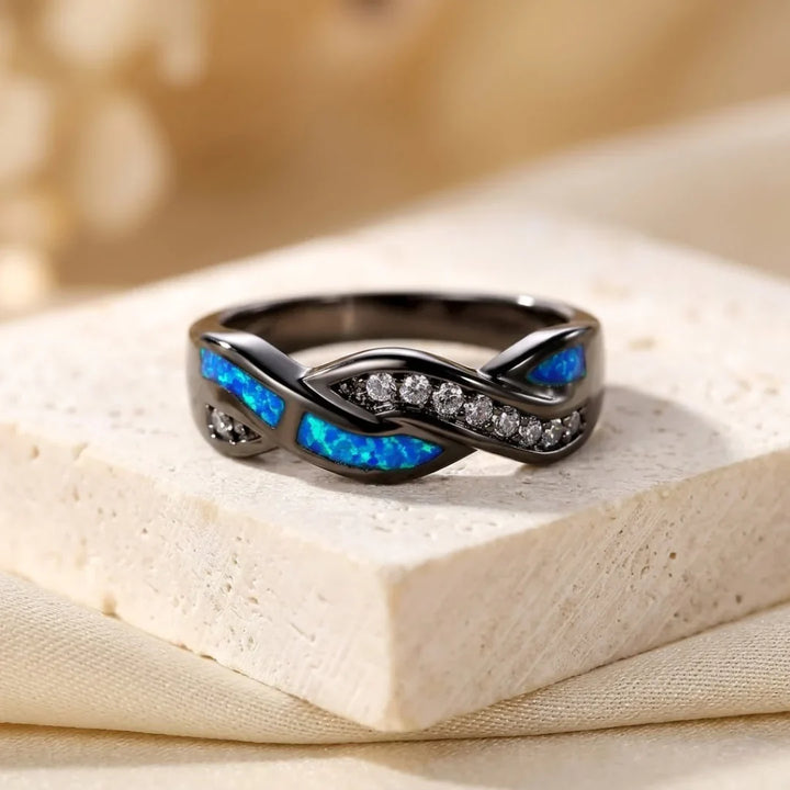 Zilveren gedraaide ring met inleg