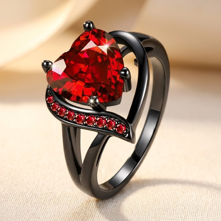 Zilveren ring met robijnen hart
