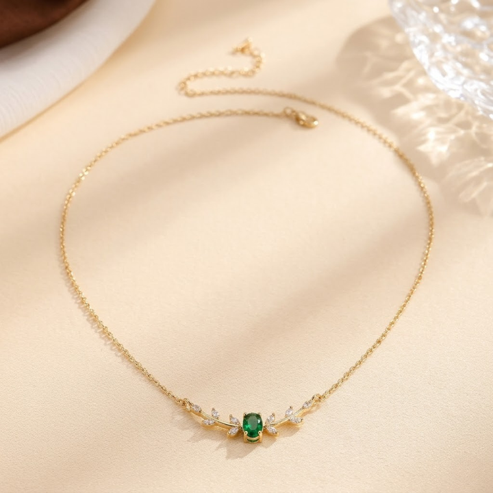 Fijne gouden ketting met smaragd