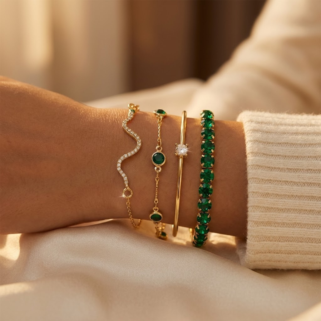 Gouden set armbanden met smaragd
