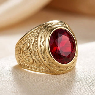 Gegraveerde gouden ring met robijn