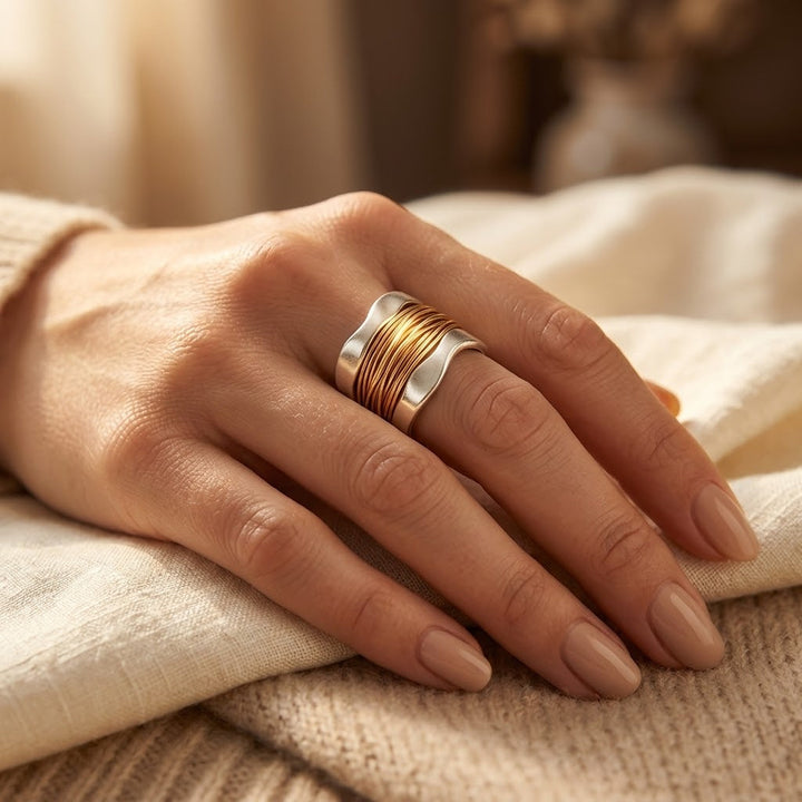 Gewikkelde ring in zilver en goud