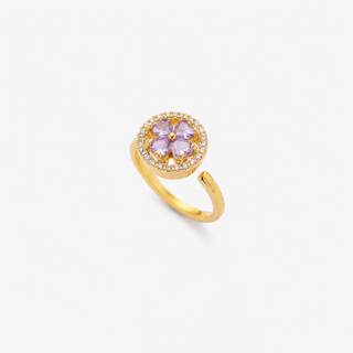 Gouden ring met bloem en saffier