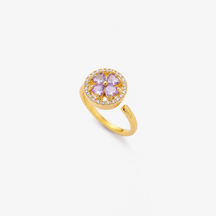 Gouden ring met bloem en saffier