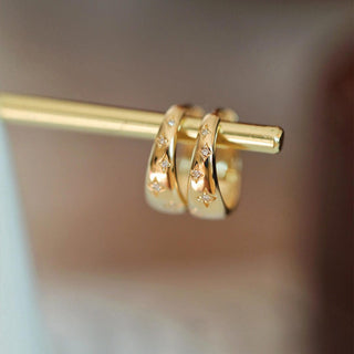 Luxuriöse Ohrringe aus Gold und Silber