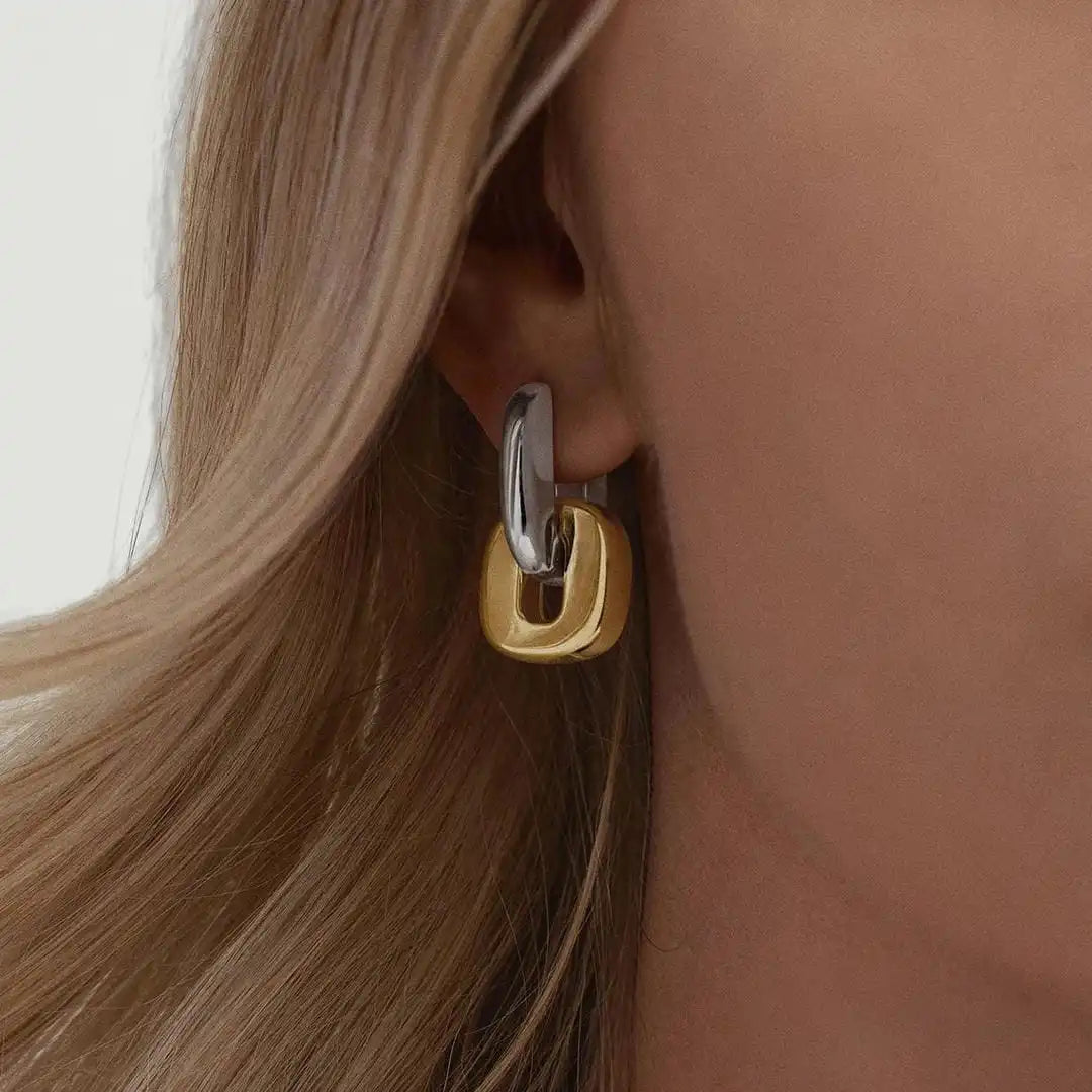 Minimalistische zweifarbige goldene ovale Ohrringe