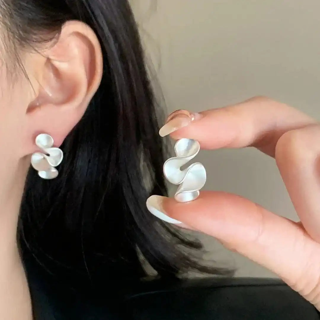 Ohrringe aus Sterlingsilber mit goldenen Blumen