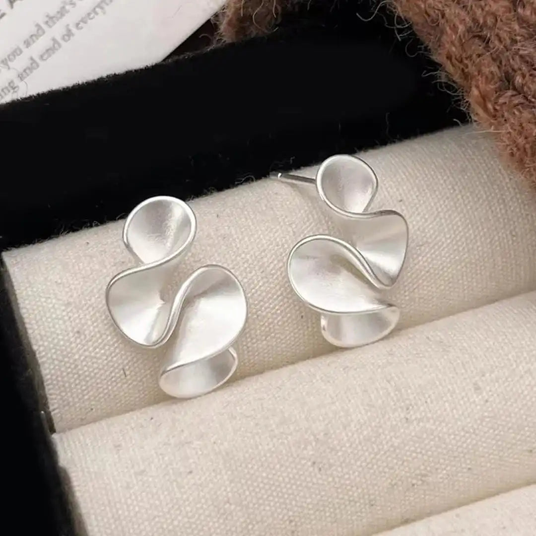 Ohrringe aus Sterlingsilber mit goldenen Blumen