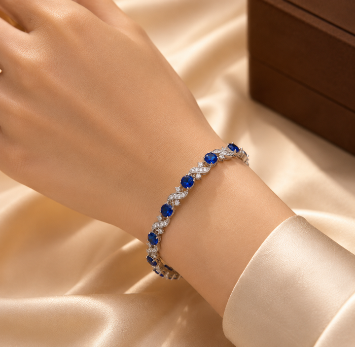 Zilveren armband met bloemen en saffier