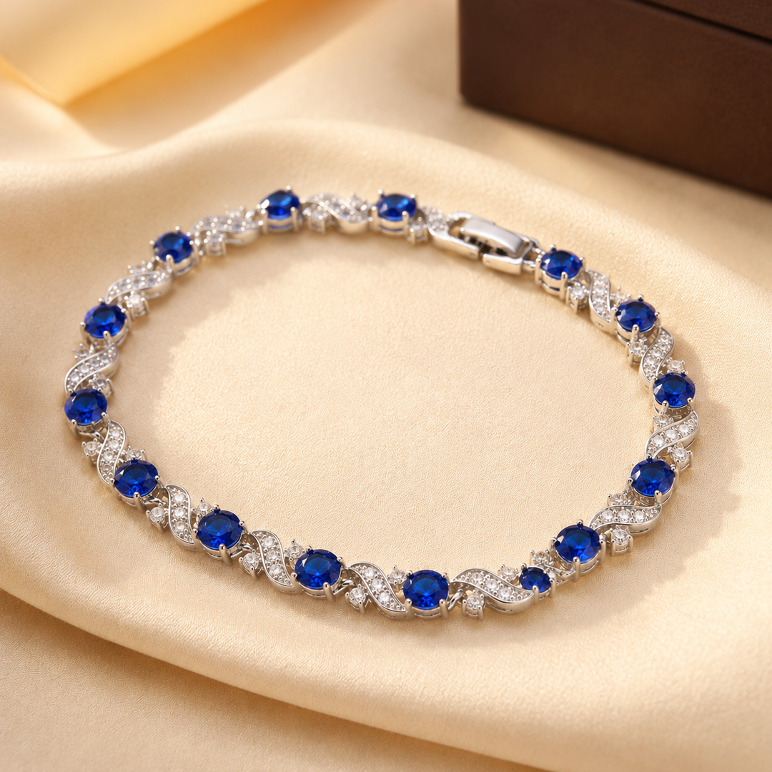Zilveren armband met bloemen en saffier