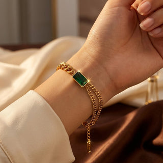 Gouden armband met smaragd op staafje
