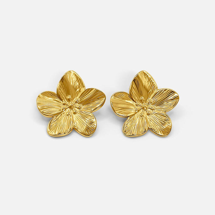 Elegante goldene Blumen-Ohrringe