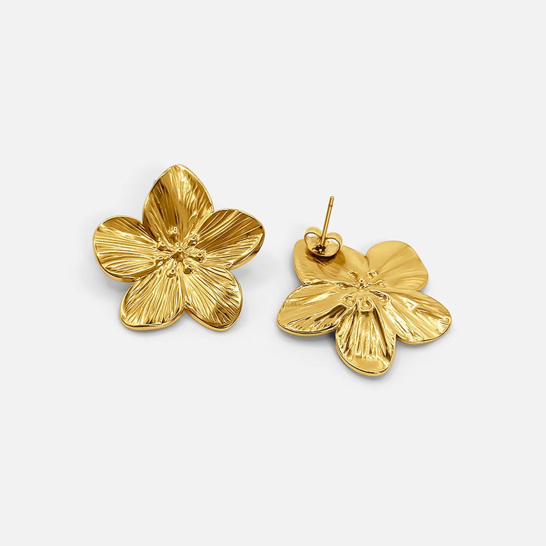 Elegante goldene Blumen-Ohrringe